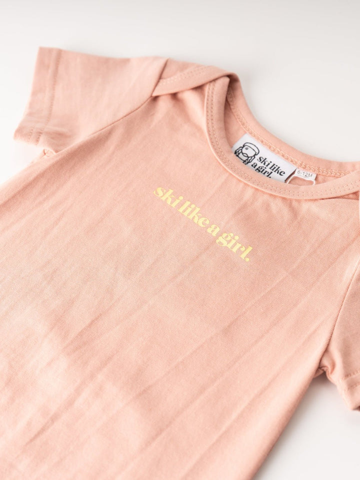 Ski Like A Girl Classic Pink Onesie - Heyday